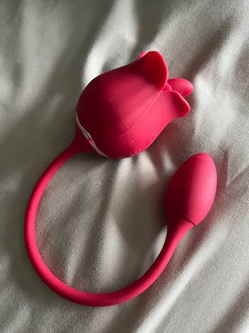 Red rose vibrator with bulb on one end