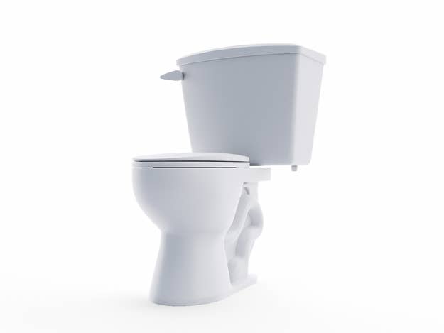 A modern toilet with a tank and bowl, shown against a plain white background