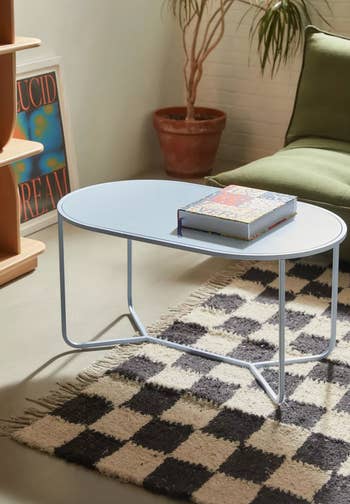 oval coffee table in light blue