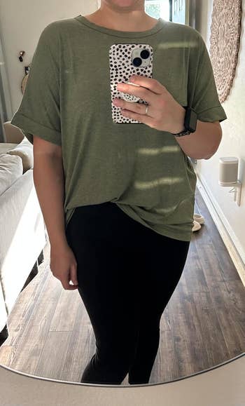 reviewer wearing garment successful green