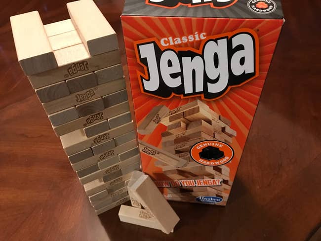 reviewer image of jenga blocks built up next to its box