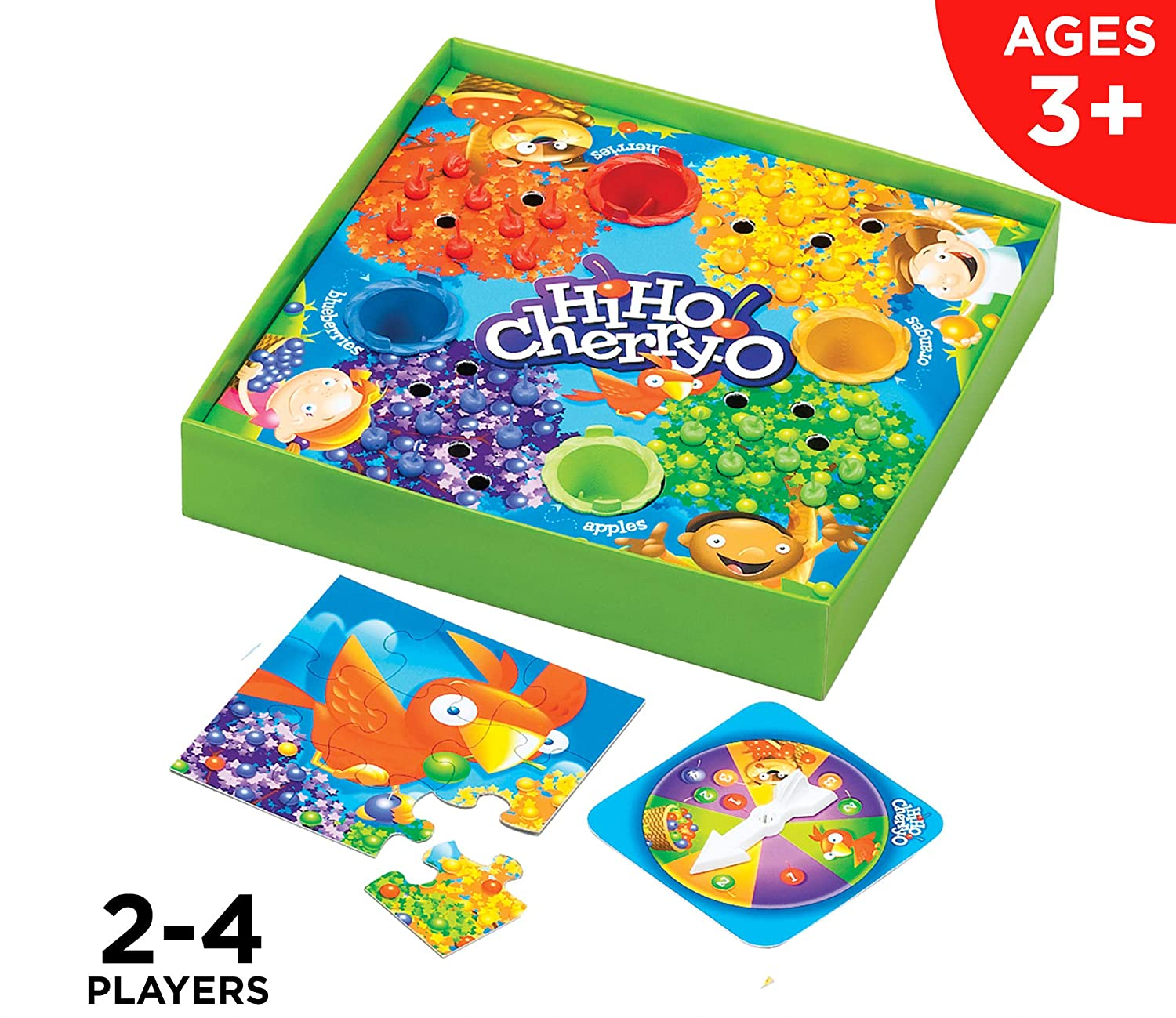 Green game board with illustrations of fruit, bird puzzle, and spinner