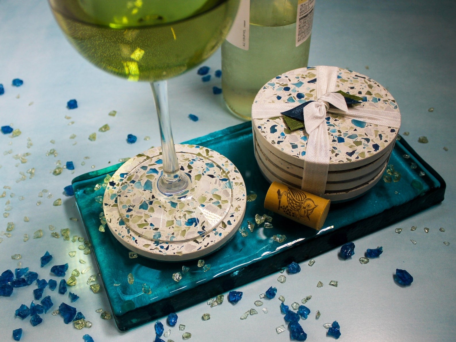 the four sage and aqua terrazzo coasters
