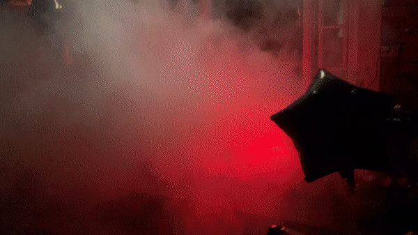 gif of the fog machine and the led lights changing colors 