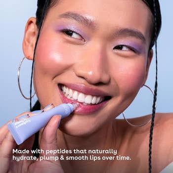 Person applying lip balm with text: