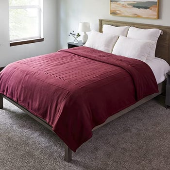 The red blanket on a bed