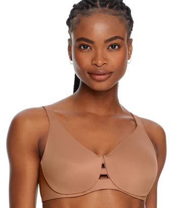 Front of model wearing a neutral minimizer bra