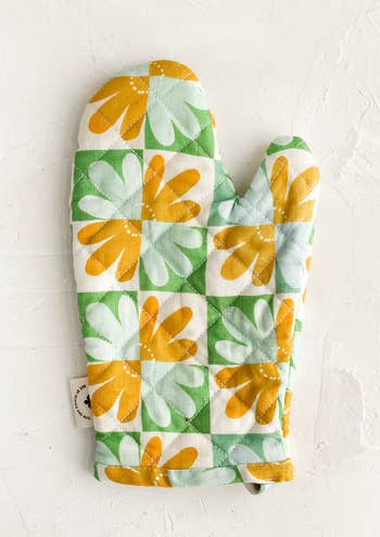 orange and green floral oven mitt