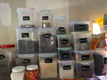 reviewer photo of assorted airtight bins, labeled, with baking ingredients inside