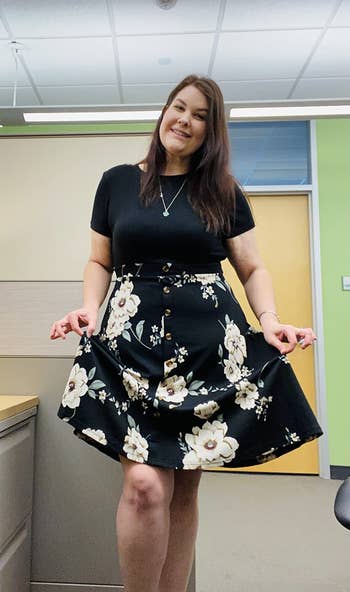 reviewer wearing black and white floral version