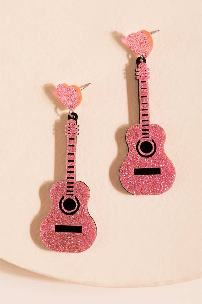 pink glitter resin guitar drop earrings with heart shaped post