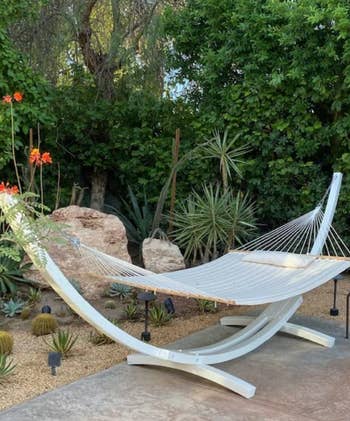 review image of hammock hung up on modern, curved base