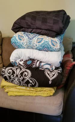 Reviewer pic of a pile of thick blankets