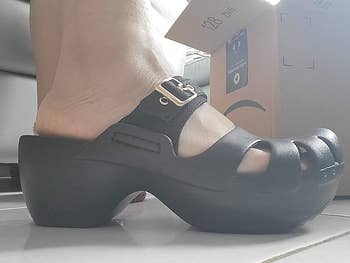 side view of the black clogs