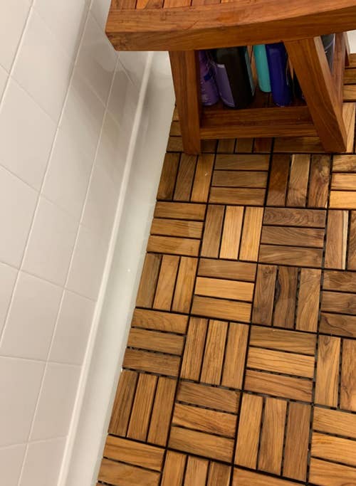 reviewer's teak tiles on shower floor
