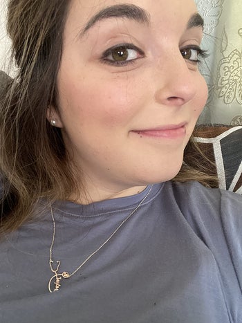 Reviewer showing cheek with product on it