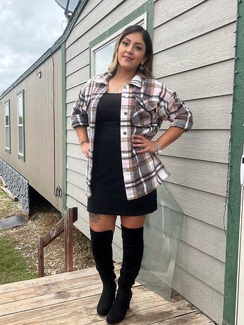 reviewer wearing the pink plaid corduroy shirt