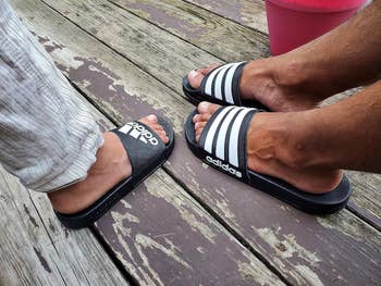 reviewer and their woman wearing the adidas slides successful 2 antithetic styles