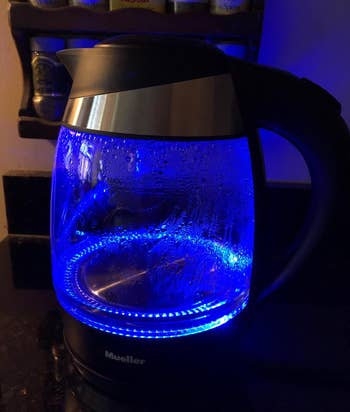 Reviewer image of the electric kettle blue and boiling water 