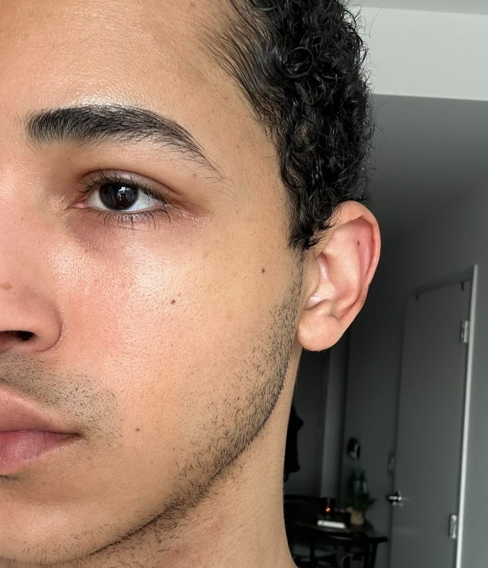 reviewer with glowing skin and minimized pores