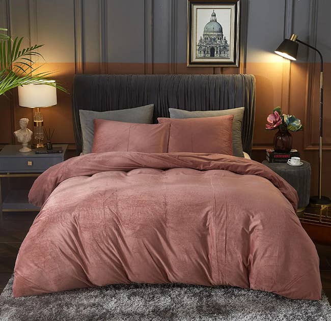 blush pink velvet duvet cover on bedspread in bedroom
