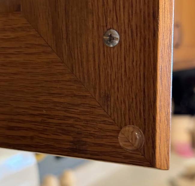 close up look at one of the bumpers on a cabinet