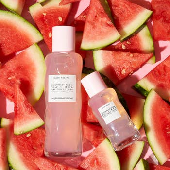 Glow Recipe skincare products with watermelon slices, featuring Watermelon Glow PHA+BHA Pore-Tight Toner and Watermelon Glow Niacinamide Dew Drops