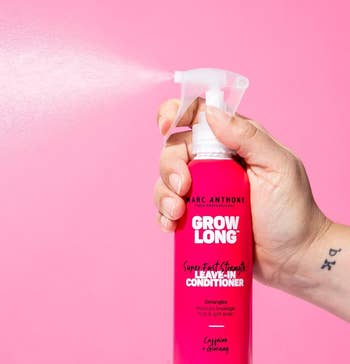 Hand sprays Marc Anthony Grow Long leave-in conditioner, highlighting product use