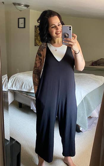 reviewer wearing the jumpsuit in black