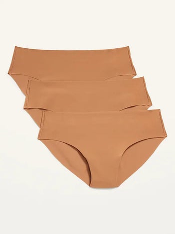 three pairs of nude no-show hipster underwear