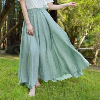 Model in long blue maxi skirt with elastic waistband 