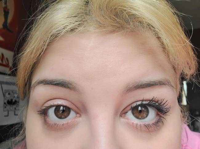the close oculus has afloat mascara applied, portion the near oculus is without