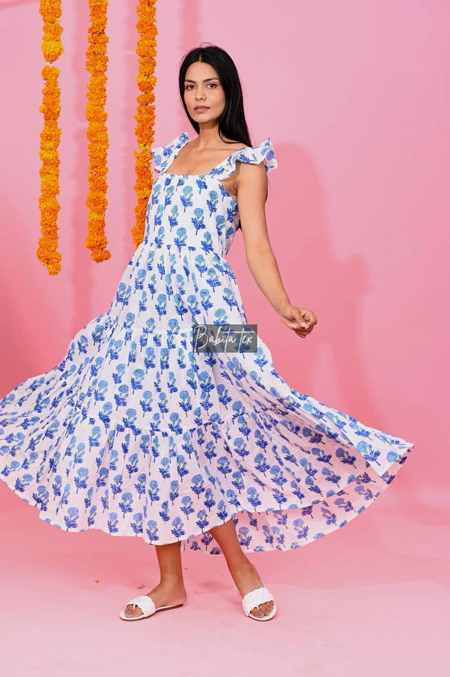 model wearing floral maxi dress