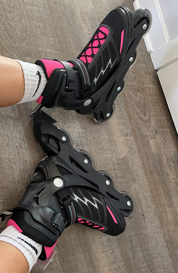 Reviewer wearing the black and pink skates with white socks