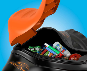 Orange seat of tricycle lifted to reveal storage space