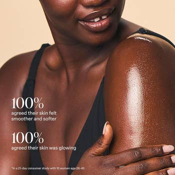 model rubbing lipid  onto their limb  with substance   