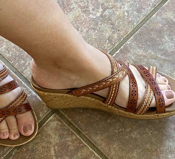 Reviewer wearing brown sandals