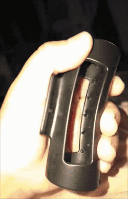 gif of reviewer showing that the claw clip is flexible by squeezing it with their hand