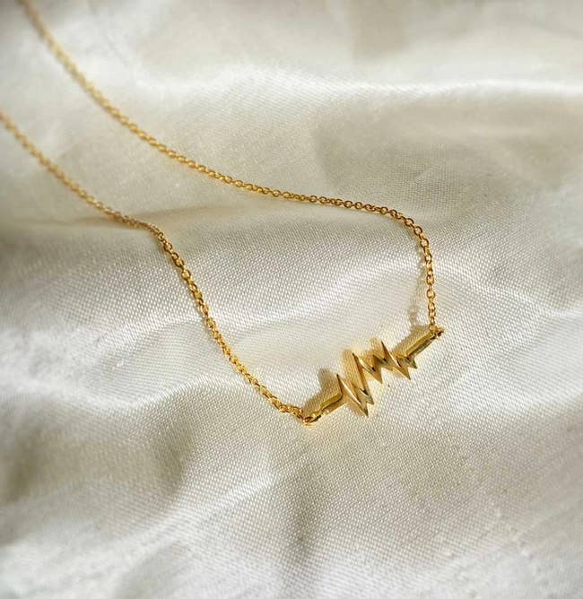 a gold lifeline necklace