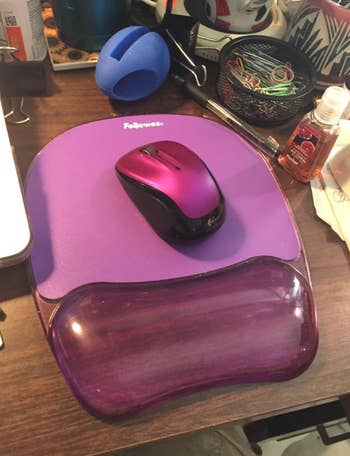 reviewer photo of purple gel mouse pad with wrist support