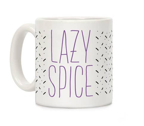 white mug with black and purple pattern and purple 