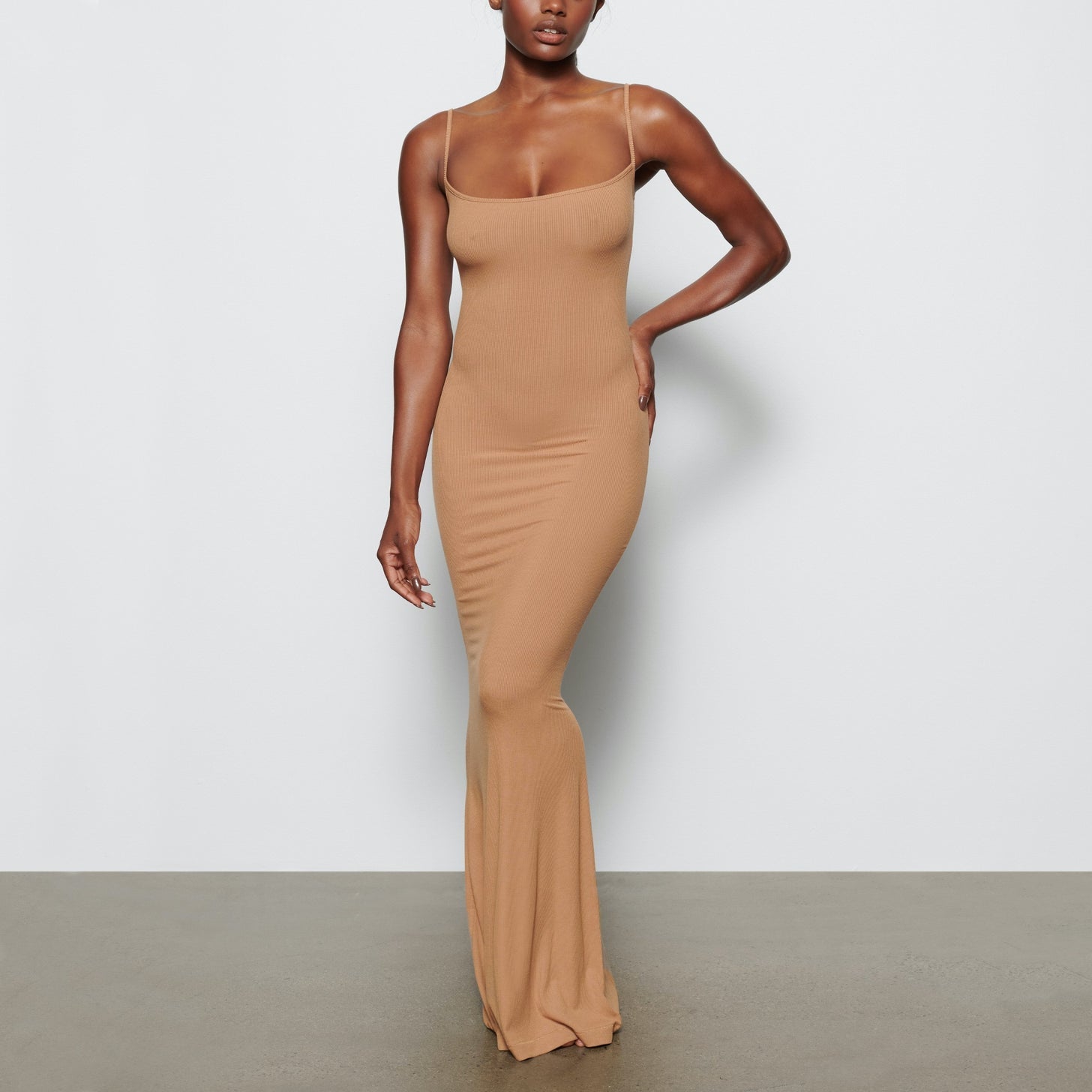 model wearing the full-length bodycon