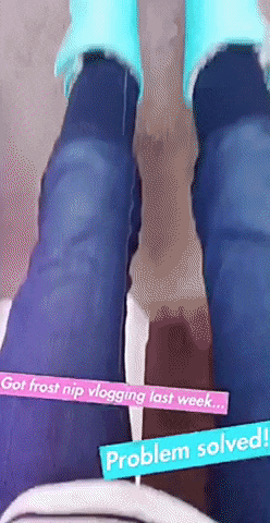 gif of a reviewer zooming in on their bright blue snow boots