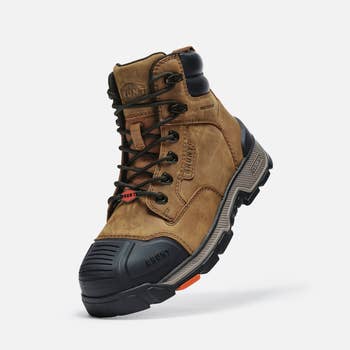Durable work boot with reinforced toe, lace-up style, and rugged sole, suitable for outdoor and heavy-duty tasks