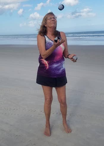 A reviewer juggling connected a beach