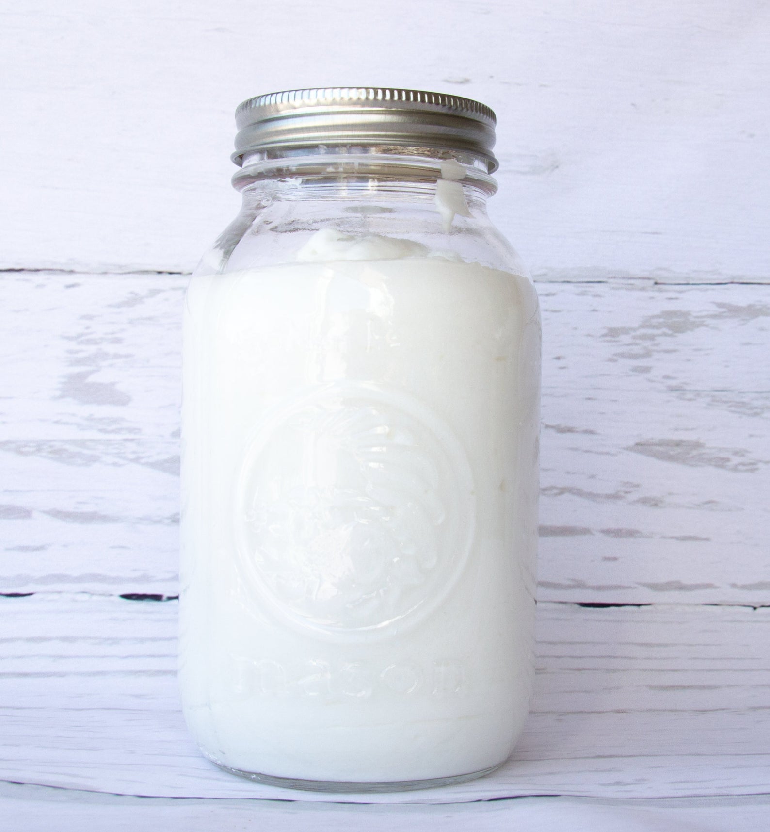 a mason jar of natural laundry detergent 