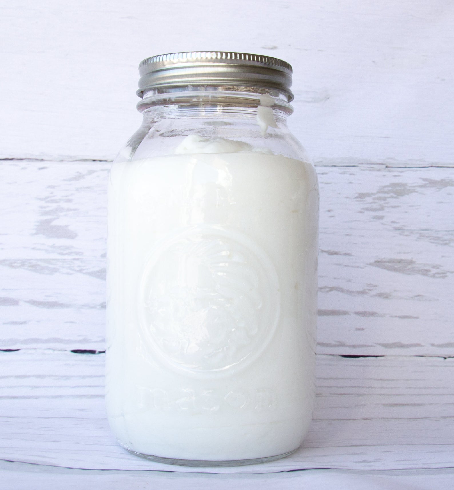 a mason jar of natural laundry detergent