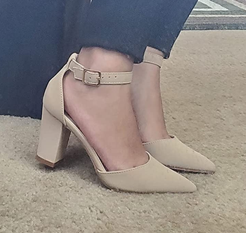 Reviewer wearing beige heels