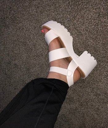 different reviewer wearing the same sandals