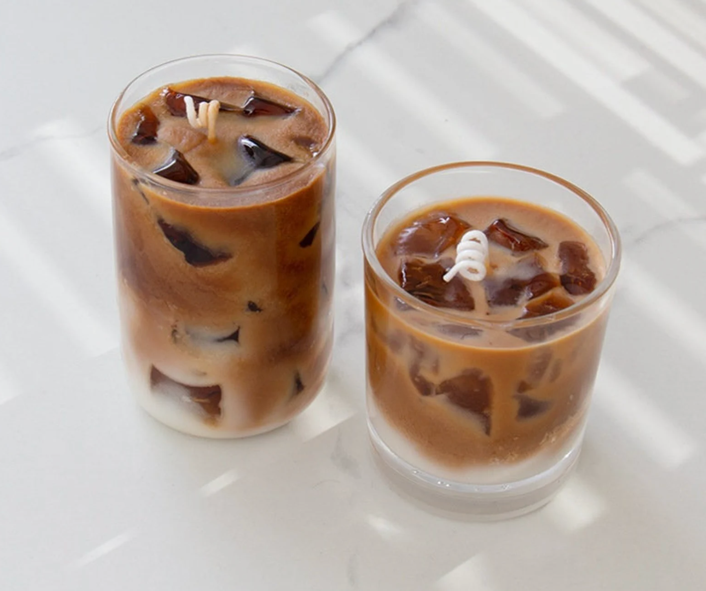 two different sizes of iced coffee candles